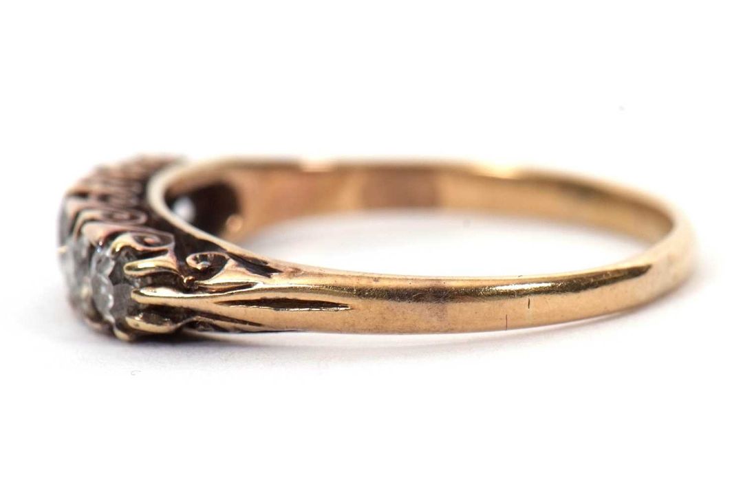 A five stone diamond ring, the five graudated old mine cut diamonds, total estimated approx. 1. - Image 2 of 6