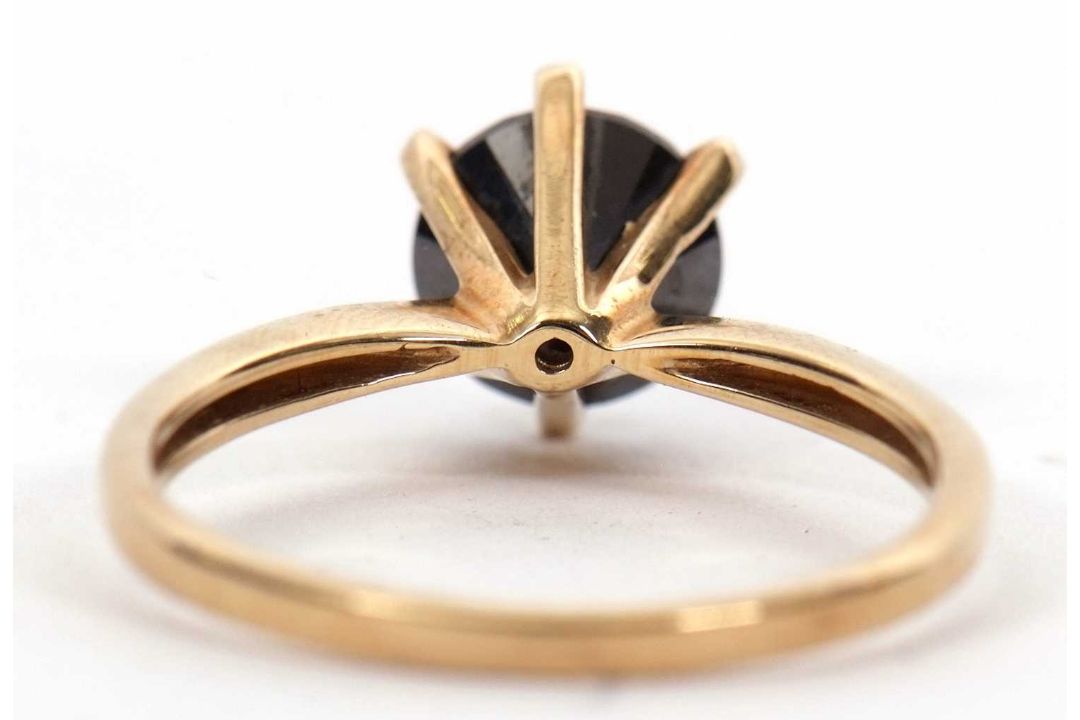 A 9ct black diamond ring, the round brilliant cut diamond, estimated approx. 2.0cts, in a six claw - Image 2 of 5