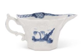 A Worcester porcelain hexagonal cream boat, circa 1758 with blue and white Chinoiserie design (