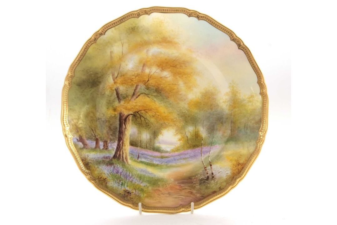 A Royal Worcester cabinet plate painted with a forest scene with bluebells, indistinctly signed - Image 2 of 4