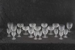 A suite of Waterford glasses including dessert glasses, spirit glasses and goblets All in good