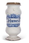 An 18th Century Delft drug jar with central cartouch entitled C.Hamech, 24cm high 2 chips to rim