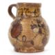An early 18th Century pottery mug, possibly Devon slip ware decorated with tulips and dated 1743, - Image 2 of 7
