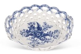 A fine 18th Century Worcester porcelain basket with blue printed pine cone design and painted