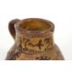 An early 18th Century pottery mug, possibly Devon slip ware decorated with tulips and dated 1743, - Image 7 of 7
