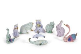 A group of Herend porcelain models of animals including a Panda, two Rabbits, a Swan, two Cats, a