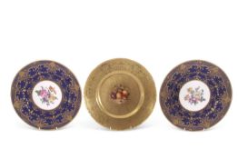 A Royal Worcester gilt decorated cabinet plate, the centre painted with fruit, signed by J