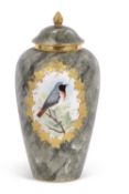 A Coalport vase and cover, painted with birds and a mottled green ground signed S Woodward Vase