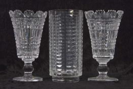A pair of Waterford Crystal cut glass vases, artisan pieces made as an award at the Waterford