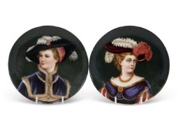 A pair of 19th century continental porcelain plates possibly Berlin finely painted with the