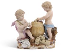 19th Century Meissen group of two cherubs, cross swords and impressed numerals to base, 14cm high