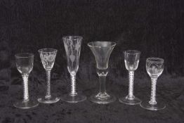 A group of six 18th Century and later drinking glasses including a wine glass with trumpet bowl on