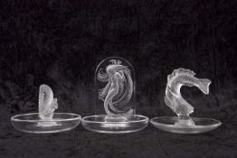 A LALIQUE NAIADE RING OR PIN DISH with central arched plaque depicting a water nymph, signed to