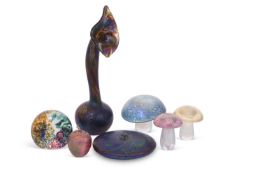 A group of John Ditchfield for Glasform paperweights and vases all with irridescent decoration