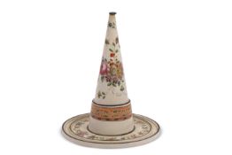 A Wedgwood creamware jelly mould core, c.1780, the conical shape brightly enamelled with sprays of