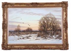Colin Burns (b.1944), Winter landscape with mallards in flight, oil on canvas, signed, 48.5x74.