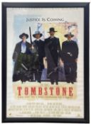 A framed one-sheet poster for Tombstone starring Kurt Russell and Val Kilmer. Bearing the signatures