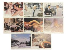 A set of 8 colour lobby cards for 1974 British Thriller, Gold, starring Roger Moore and Susannah