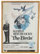 A framed reproduction one sheet poster for Alfred Hitchcock's The Birds, starring Tippi Hedren