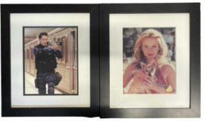 A pair of framed and glazed colour photographs, bearing the signatures of film stars Reese