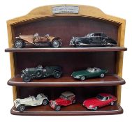 A Franklin Mint branded shelf, 'Precision Models', together with various scale model cars and