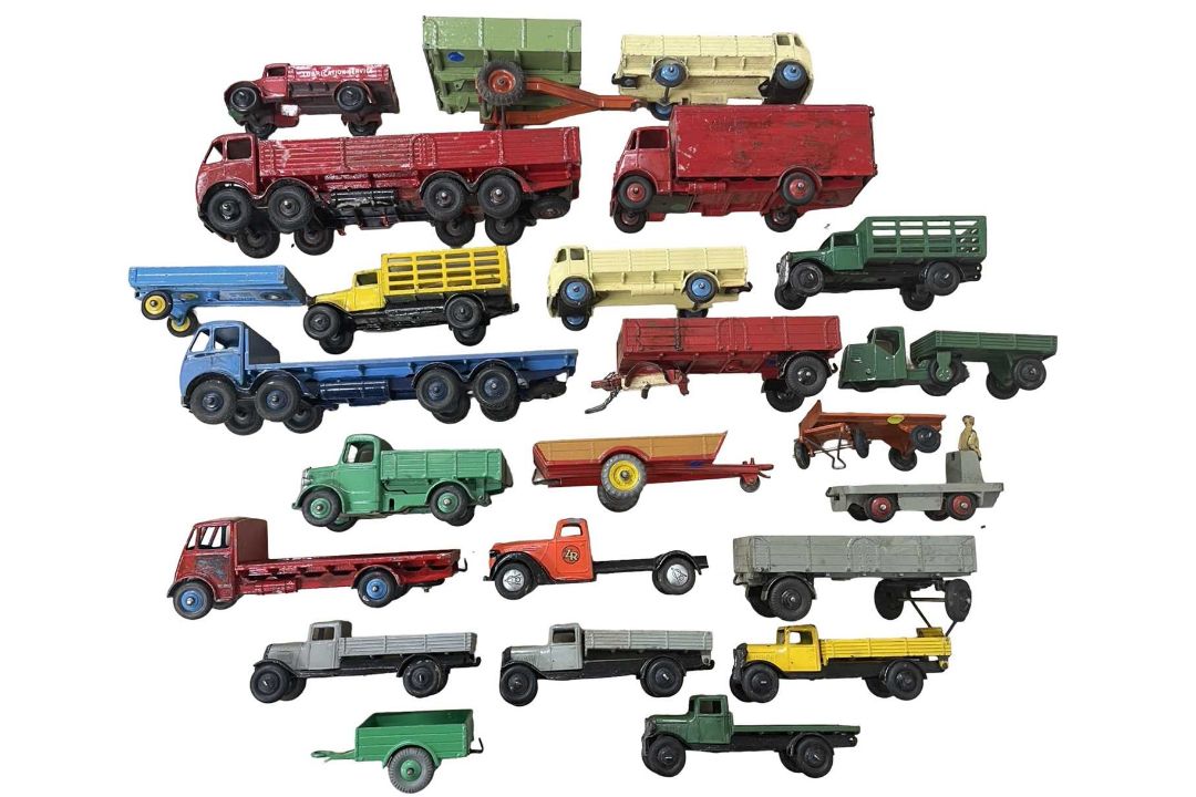 A good collection of Dinky flatbeds and trailers