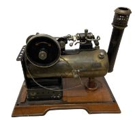 A vintage Marklin stationary steam engine, stamped to base A W Gamage, Holborn, London
