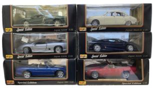 A group of six Maisto 1:18 scale Jaguars, to include: - XJ220 in green / silver / blue - Mark II