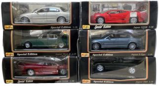 A group of six boxed Maisto 1:18 scale jaguar models, to include: - XJ220 in red and metallic