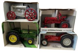 Four boxed ERTL die-cast 1:16 scale model tractors, to include: - Cub 1964-1976 - Fordson - John