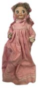 A bisque head Gebruder Heubach Einco 'Googly eye' doll, in pink spotted dress, woollen under-