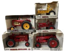 Five boxed ERTL die-cast tractor models, to include: - Cub - Farmall - McCormick WD-9 - Farmall