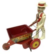 A tinplate and plastic Sam the Gardener clockwork toy by MARX