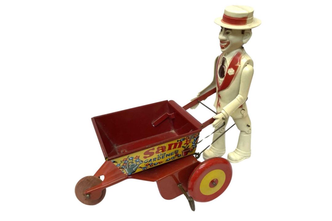 A tinplate and plastic Sam the Gardener clockwork toy by MARX - Image 1 of 2