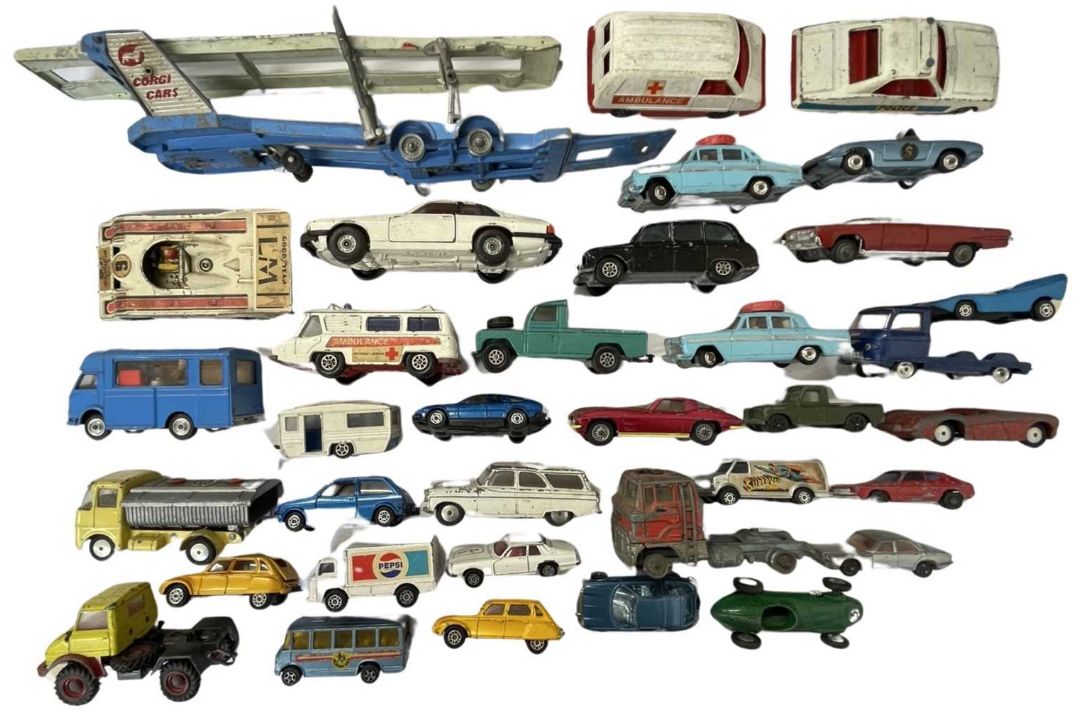 A mixed lot of playworn die-cast Corgi toys