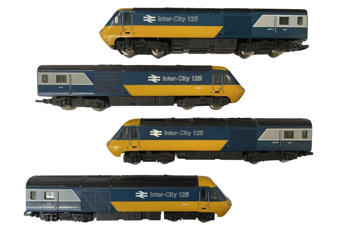 Four Hornby 00 gauge power / dummy cars
