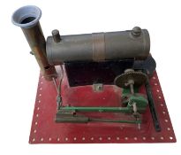 A small stationary steam boiler on base, unmarked