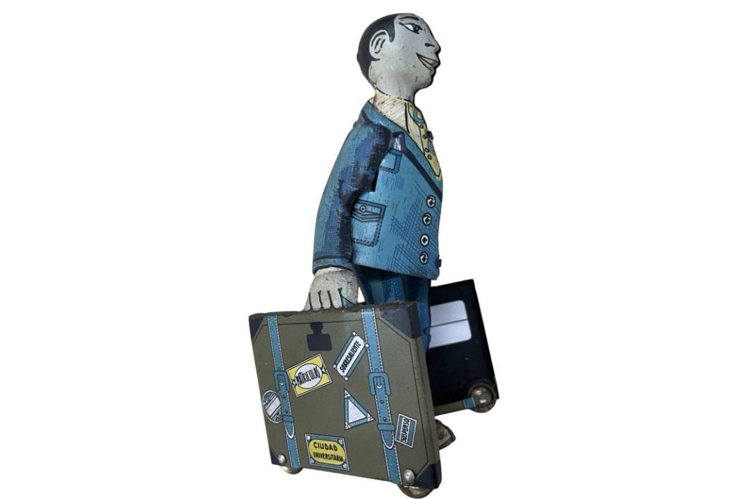 A tinplate clockwork figure, 'El Estudiante'. Some losses to paintwork and light areas of rust, - Image 3 of 4