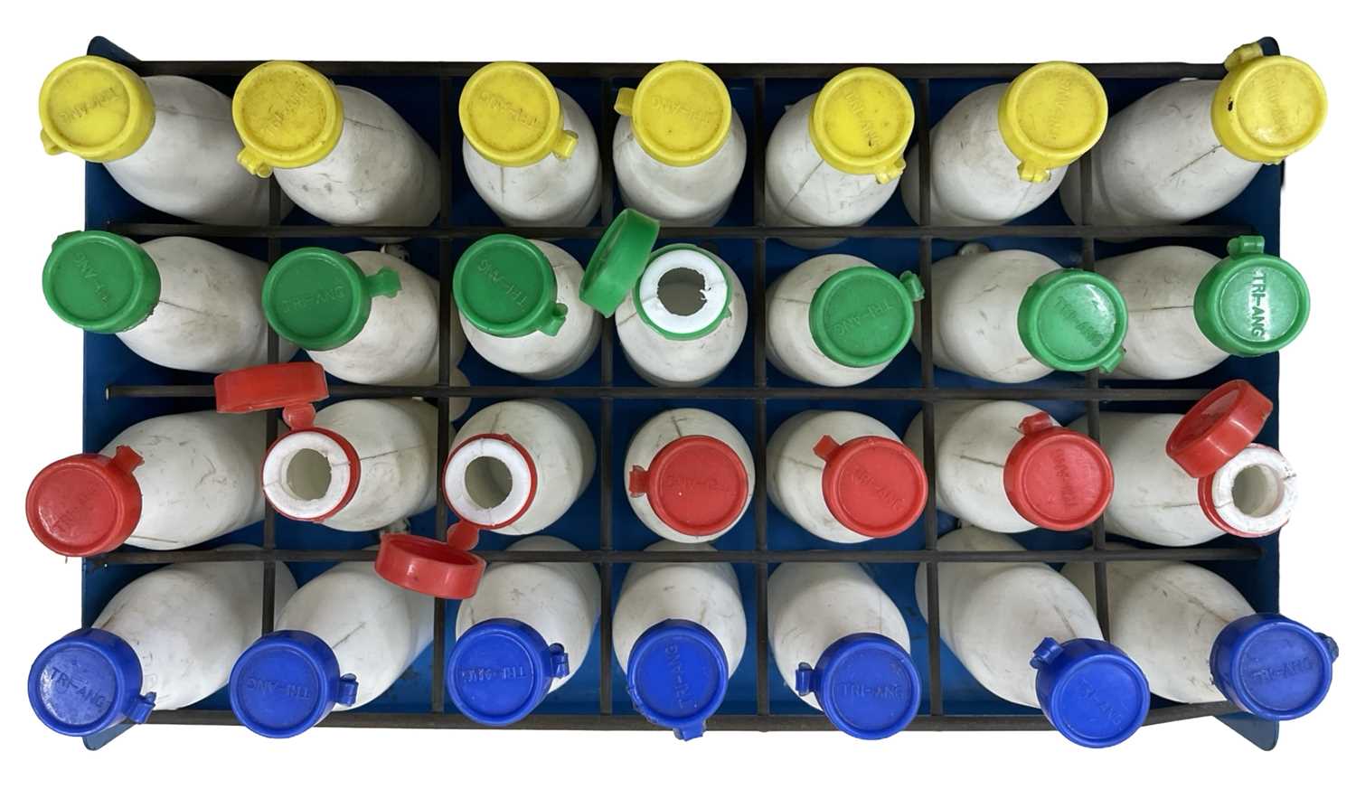 A c1950s Triang pressed steel milk float, with 28 original bottles with Triang branded caps. - Image 2 of 2