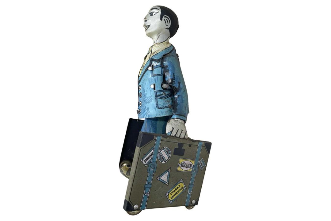 A tinplate clockwork figure, 'El Estudiante'. Some losses to paintwork and light areas of rust, - Image 1 of 4
