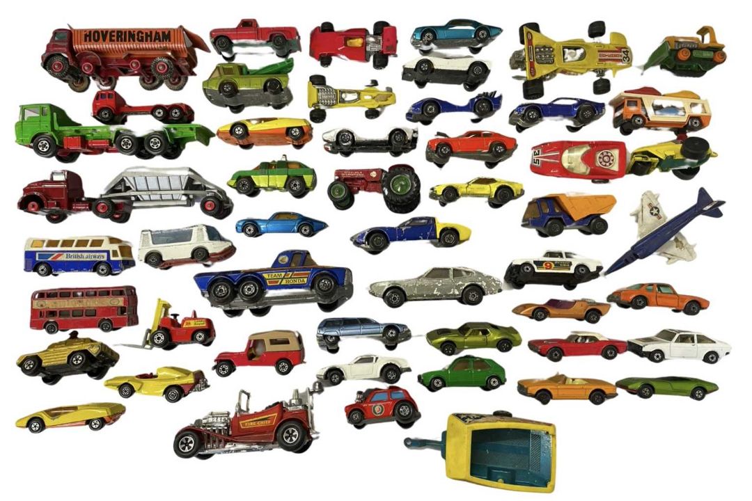 A mixed lot of playworn die-cast Matchbox vehicles