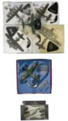 A collection of boxed die-cast aeroplane models with stands