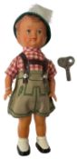 A clockwork dancing Austrian boy in Leiderhosen, with original key.