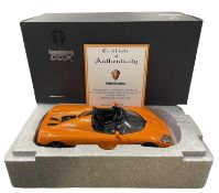 A boxed AutoArt 1:18scale model Koenigsegg CCZ in bright orange, with certificate.