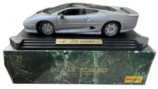A boxed Maisto 1:12 scale model Jaguar XJ220 (1992) in silver