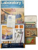 A mixed lot of vintage toy sets, to include: - Thomas Salter Laboratory 1 chemistry set - The Flying