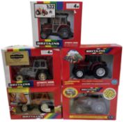 Five boxed Britains 1:32 scale model tractors, to include: - Massey Ferguson MF 362 - Limited