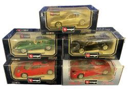 A collection of boxed Bburago model cars, to include: - 1992 Ferrari 456GT - 1961 Jaguar E Coupe -