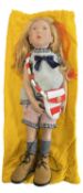 A 2020 Zwergnase Miranda artist designed vinyl doll, by Nicole Marschollek-Menzner with yellow