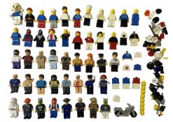 A collection of vintage Lego minifigures and accessories, plus other Lego-compatible figures